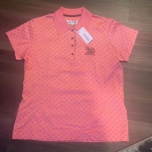Ladies peach golf shirt.